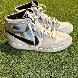 Nike Jordan Retro 1 AJKO High-Top Sneakers in Cream and Black